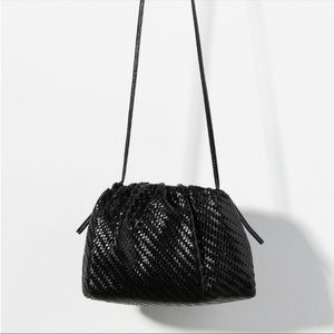 Anthropologie Frankie clutch size 10” by 7.5” by 3”